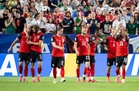 Austria and Algeria into knock-outs after dramatic draw