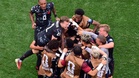 Canada reach last 16 with stoppage-time win over South Africa