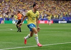 Noni Madueke reacts as Arsenal teammate Gabriel Martinelli fires Brazil into World Cup last 16