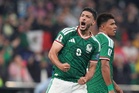 Mexico delight home fans to reach last 16 with win over Ecuador