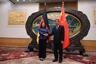 China urges Germany to back free trade, fair access as ministers meet