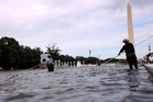 Former US Olympian charged with damaging Reflecting Pool