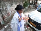 Mimicry artist Ratan Ranjan performs a satirical skit dressed as CM Mamata Banerjee