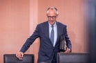 A year in, embattled Merz says impatience is his biggest weakness