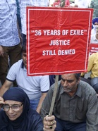 Kashmiri Pandits protest in Jammu against food Act integration, scuffle with police