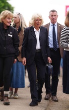 Queen Camilla breaks tradition as she swaps dresses for trousers