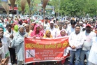 Brooms in hand, sanitation workers take to the streets in Karnal