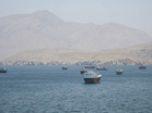 Iran's IRGC warns US assets against strikes on its vessels in Persian Gulf, says missiles "locked" onto targets