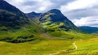In Europe, explore the deep valleys and haunting hills of Glencoe, Scotland’s wild beating heart beneath the Highlands