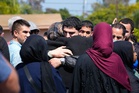 Police say 'heroic' security guard saved lives in US mosque shooting