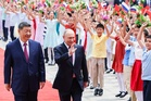 Putin hails Russia-China ties as ‘stabilizing’ force on Beijing visit