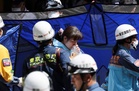 Over 20 taken to hospital after unknown substance allegedly sprayed in Tokyo shopping area