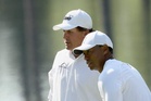 Phil Mickelson and Tiger Woods make opposite Open Championship decisions