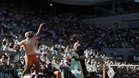 Djokovic fights through French Open as Rybakina drops out in surprise loss