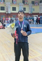 Inspired by sister, city wrestler eyes Olympic glory after national silver