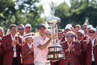 How Russell Henley’s career earnings on the PGA Tour compare to Joaquin Niemann’s on LIV Golf as both win this weekend