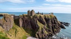 In Scotland, this medieval castle perched on a cliff is one of the most spectacular in the world (and you can walk through its ruins!)