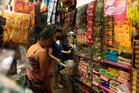 Cautious spending seen benefiting sari-sari stores