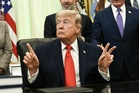 Trump says Hormuz Strait to open to all
