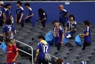 Japan fans clean up World Cup stadium