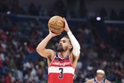 Trae Young agrees to a 4-year extension with Washington Wizards, AP source says