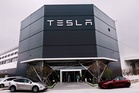Top auto regulator opens special probe after a Tesla slams into a Texas home, killing a 76-year-old