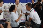 First lady distributes rice to Tondo indigents