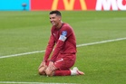Ronaldo double fires Portugal, Ghana thwarts England