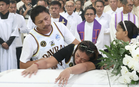 Sea of mourners fills streets as Rene Baterbonia laid to rest