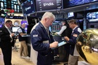 Most of Wall Street rises, but sinking AI stocks send it lower for the week