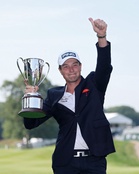 Hovland defeats Scheffler in playoff   