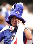 Japan fans stunned as Brazil advances