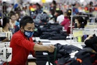 Global AI wave revs up Asian factories, offsetting war-induced pain