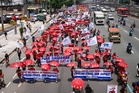 Protesters in Manila march to Quezon City ahead of Marcos SONA