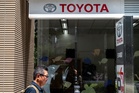 Toyota raises profit forecasts on weak yen