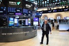 US stocks hold near records on hopes of an agreement with Iran