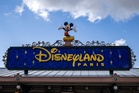 Theme parks boost Disney profits above expectations