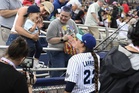 Women’s pro baseball makes rainy debut