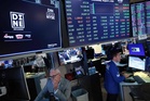 US stocks edge down from their record after oil prices climb 5%