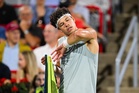 Bloodied but unbowed, Shelton reaches Montreal final