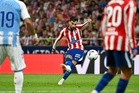 Atletico opens Liga with win over Malaga