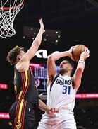 Mavs buy out Thompson, bound for Heat