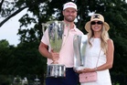 Clark fends off McIlroy to rule BMW Championship