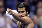 Alcaraz rallies to reach US Open third round
