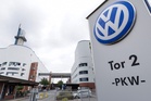 Volkswagen approves cutting 50,000 more jobs