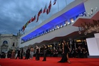 At the Venice Film Festival, grappling with the state of the world and crying with Oasis
