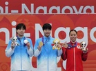 China swim sensation, 13, sets Games record after Japan win early