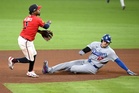 Dodgers push Braves to brink of MLB exit