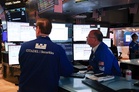 Wall Street finishes its record-setting week with gains