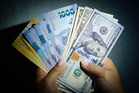 Peso drops to new low
